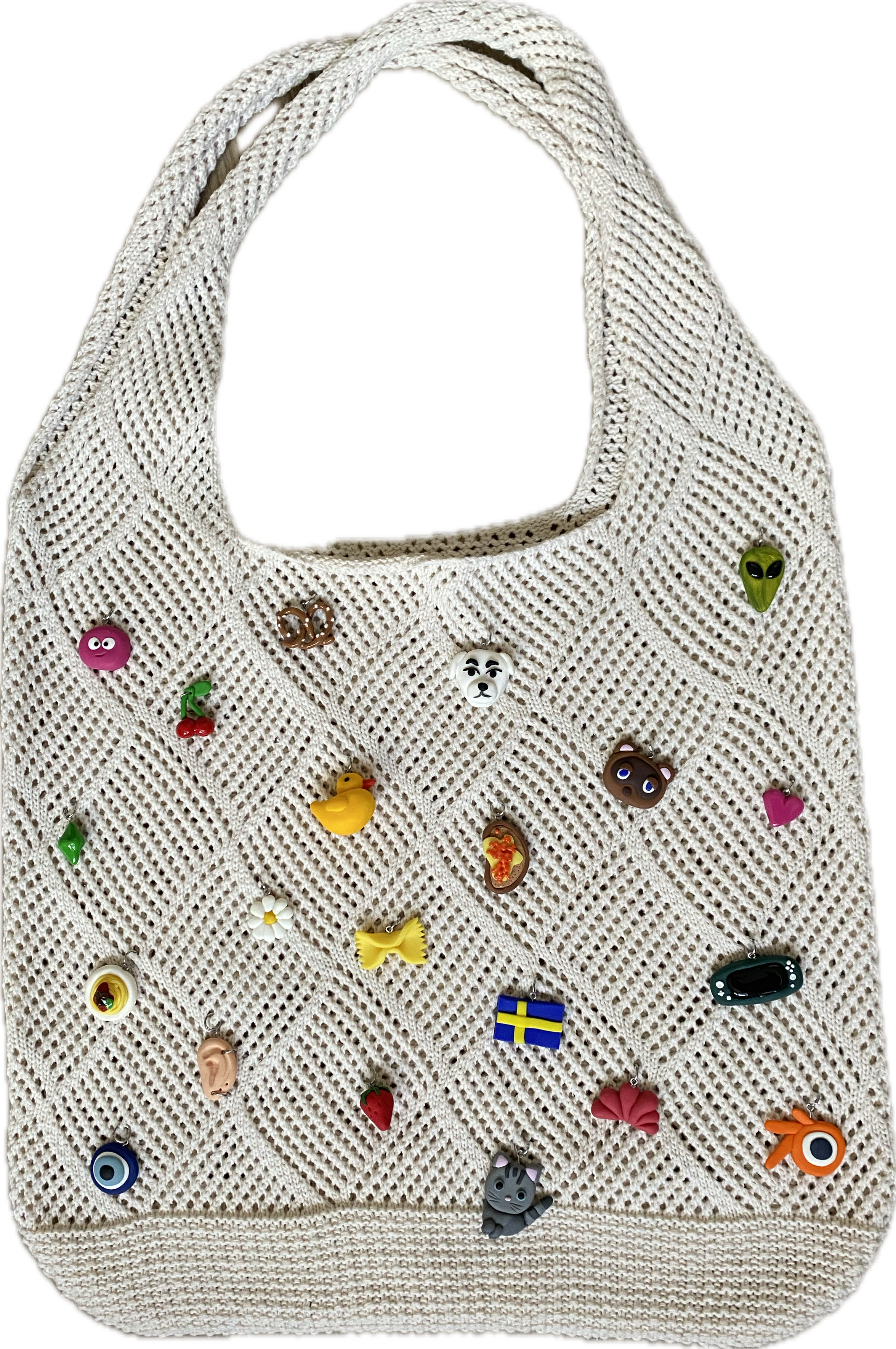 white crochet with charms
